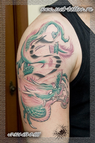 Фото мужской тату. Татуировка - дракон. Небольшое дополнение к букве S.