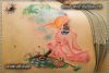 Фото тату на тему мультов. Женская цветная татуировка на лопатке.